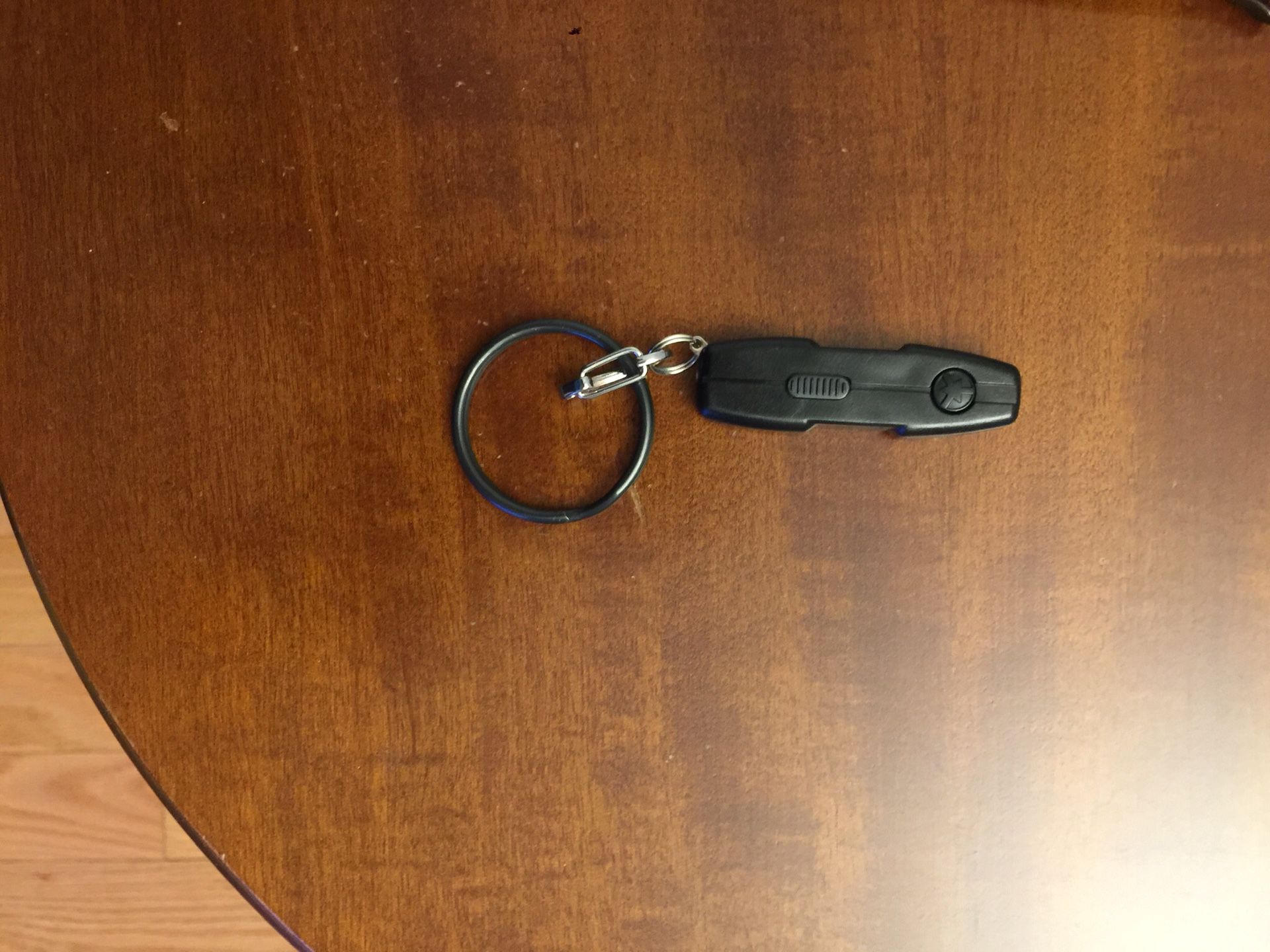 Retractable handcuff key
