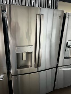 NEW OPEN BOX GE FRENCH STYLE STAINLESS STEEL REFRIGERATOR
