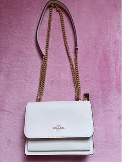 White crossbody Coach bag