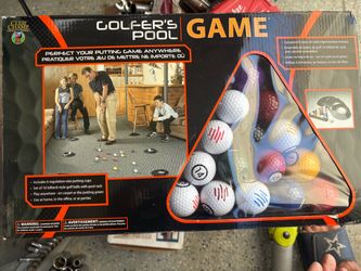 The Club Champ Golfer's Pool Game is an indoor putting set that combines golf and billiards using 16 billiard-style golf balls and a putter rack