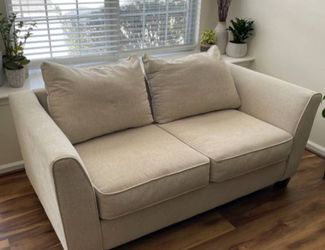 Cream Love Seat Available for Delivery