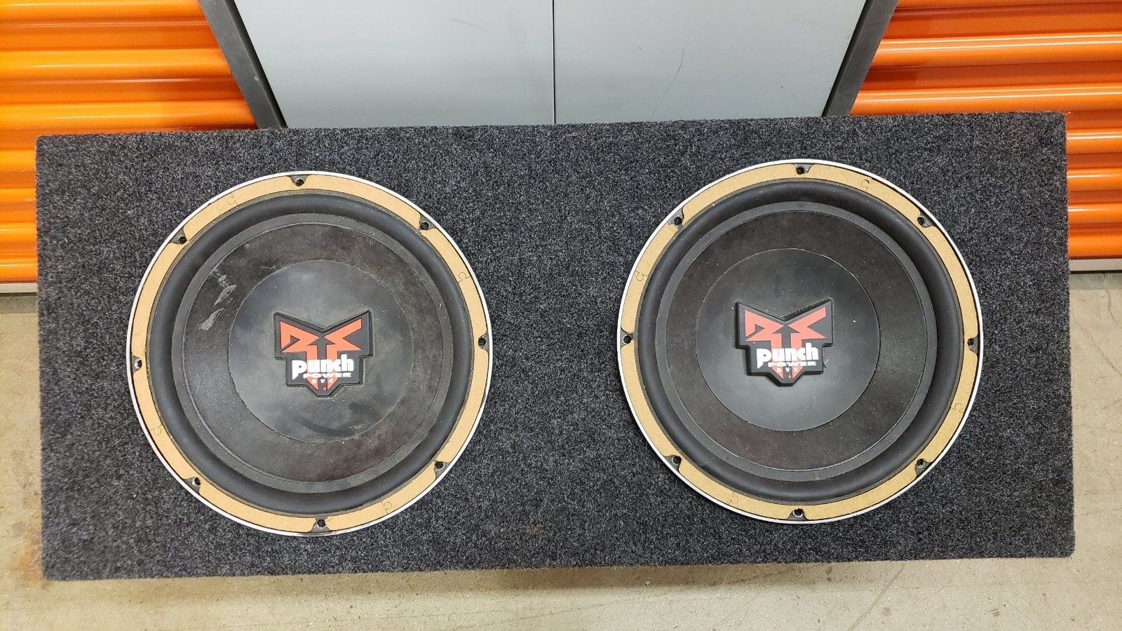 Rockford Fosgate Punch Power Subwoofers with box.