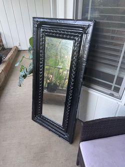 Black wooden mirror