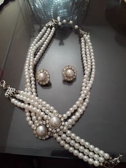 Set necklace, earrings, and bracelet