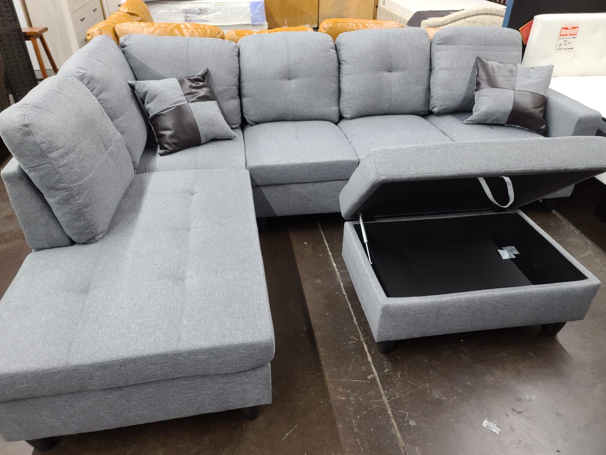 Grey Sectional With Storage Ottoman