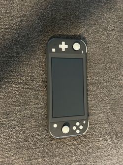 Nintendo Switch Lite w/ Games