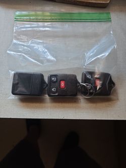 Lot of 4 OEM Ford / Mercury Key Fob Remotes (3-Button) + reprogramable rfid key for alarm box