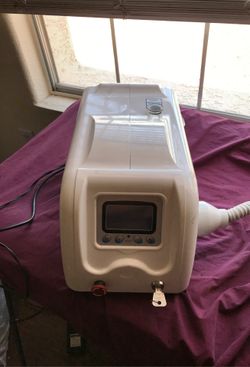 Tattoo removal machine