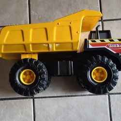 Previously Owned Metal And Plastic Tonka  Trucks Is