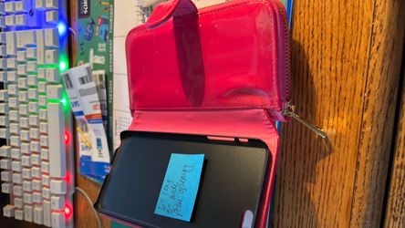 Hot pink phone holder/wallet with wrist strap