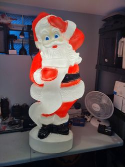 Vintage union products Santa with list blow mold
