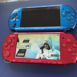 Red PSP 3000 with charger and games. $195 each LMK. Blue available but analog defect still works 