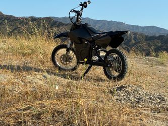 Razor MX650 Dirt Rocket Off-Road Motocross Bike – 36V Electric Ride-On, Up to 17 mph, Dual Suspension, Hand-Operated Dual Brakes, Twist Grip Throttle,