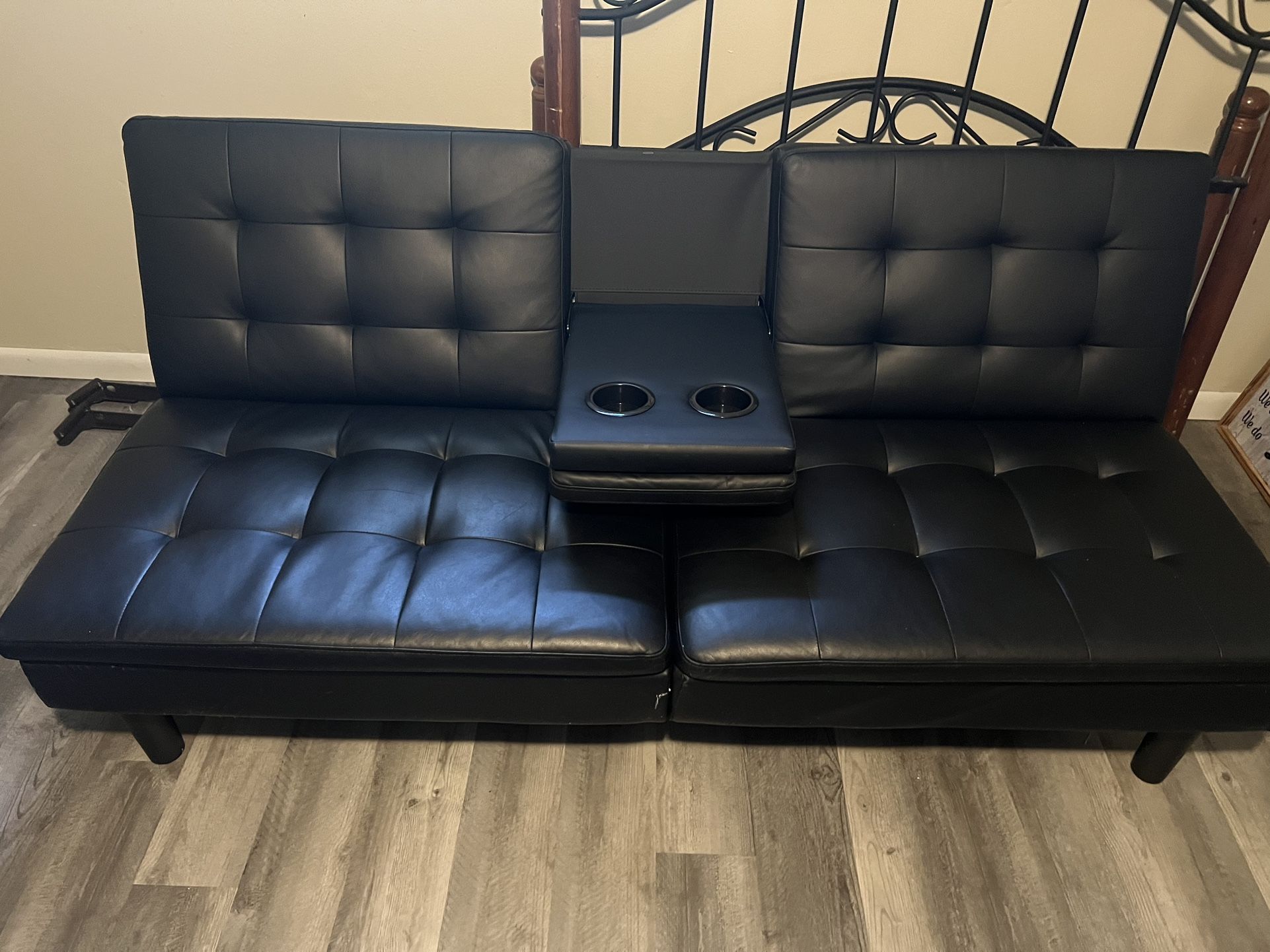 Black Leather Futon With Middle Folded Storage Cup Holders for Sale in