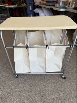 Rolling Laundry Sorter + Ironing Board – $20