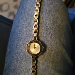  Coach ladies' silver-tone bangle watch. 