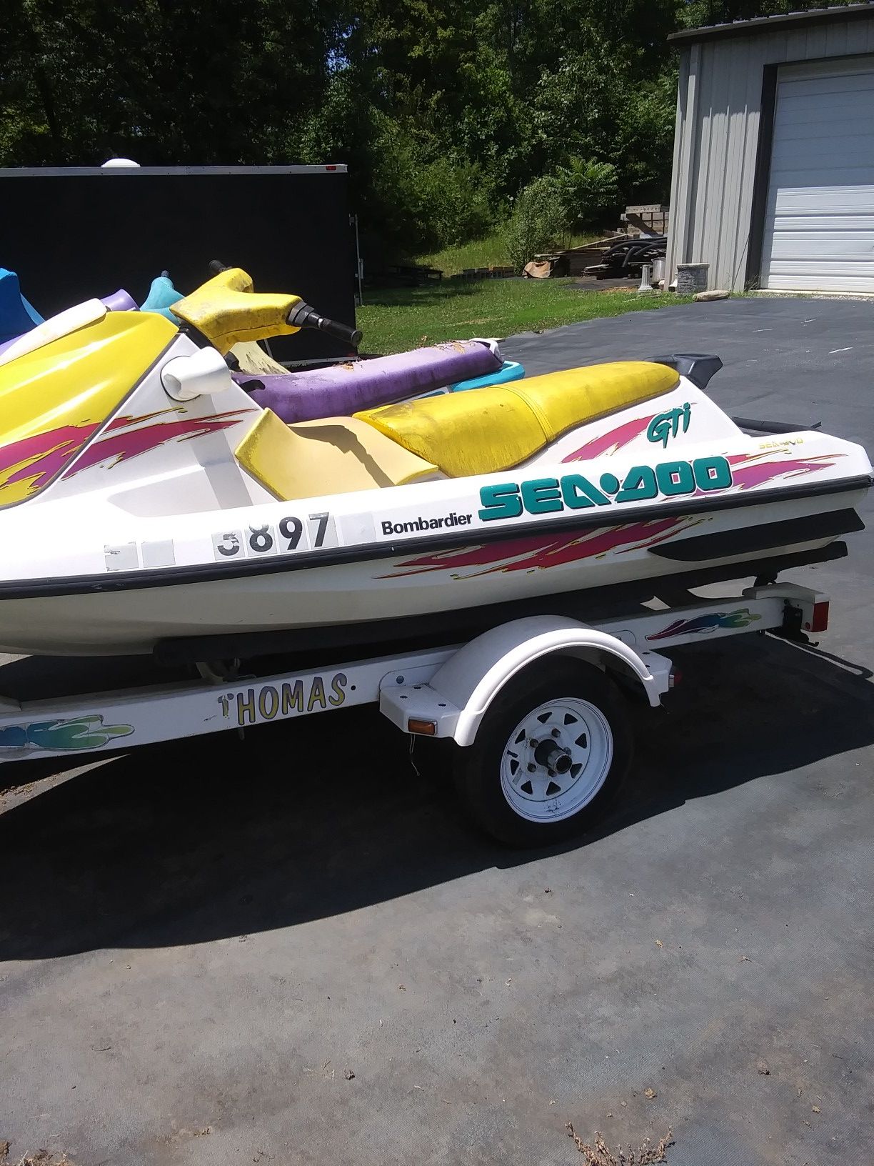 Photo Sea Doo and Polaris sea doo with trailer