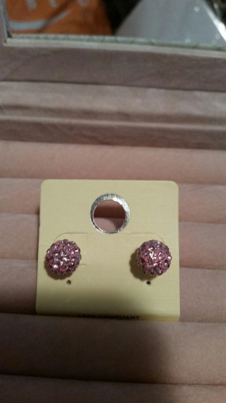 Pink glittery stud earrings