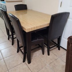 Table And 4 Chairs