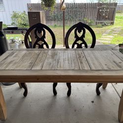 Wooden Table With Two Chairs