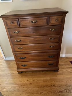 Beautiful solid wood dresser by Cal Shops hW37x L48xD 18 with a warm maple finish and classic antique-style