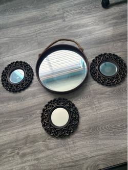 Mirror 14 and 10 in diameter $5