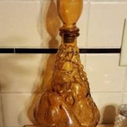 Vintage amber glass fruit glass decanter bottle. East, west or north about 12" - 15"