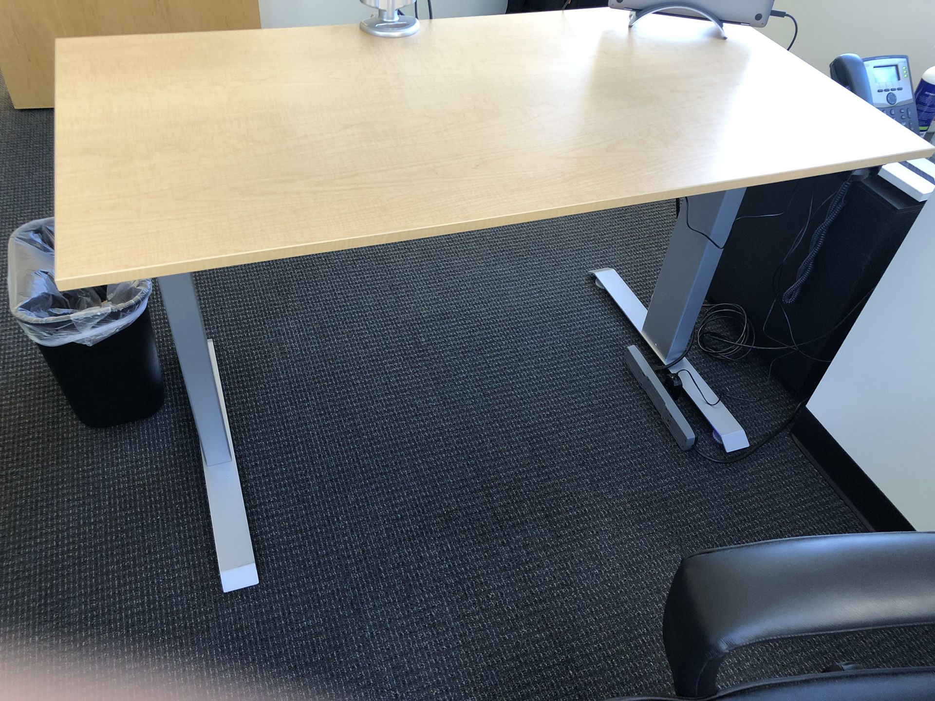 Multi Table motorized adjustable height desk.