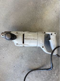 Electric drill 1/2”, tow chains, hitch ball, floor jack, dolly