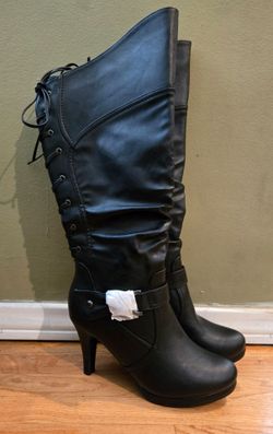 Brand new black knee-high boots, never worn. Size 8.5.