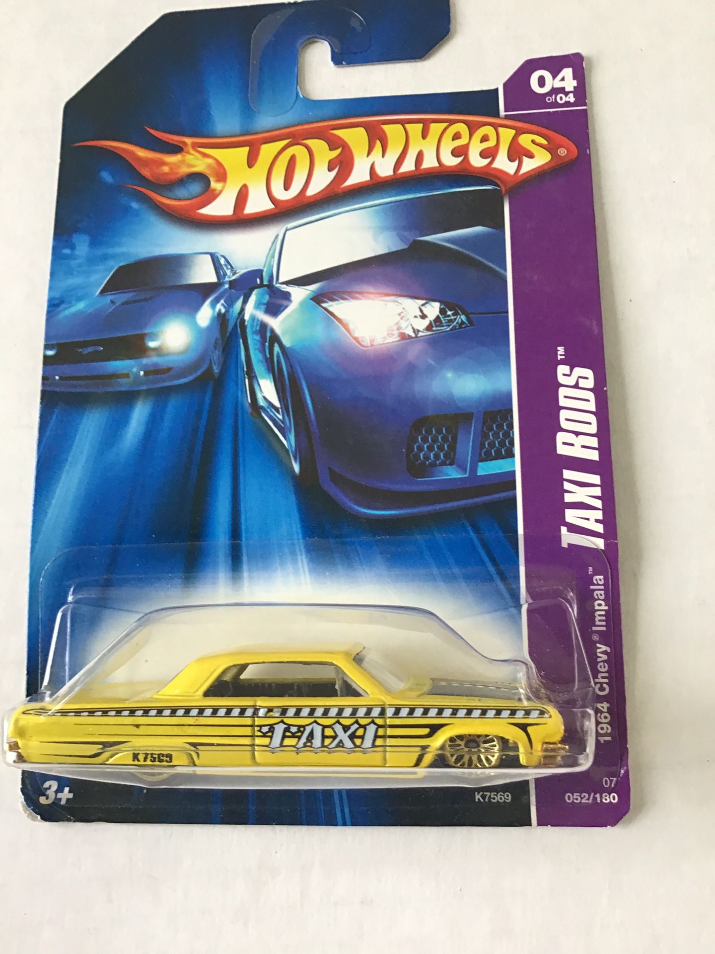 Hot wheels 2006 Series 64 Chevy impala taxi with gold rims.