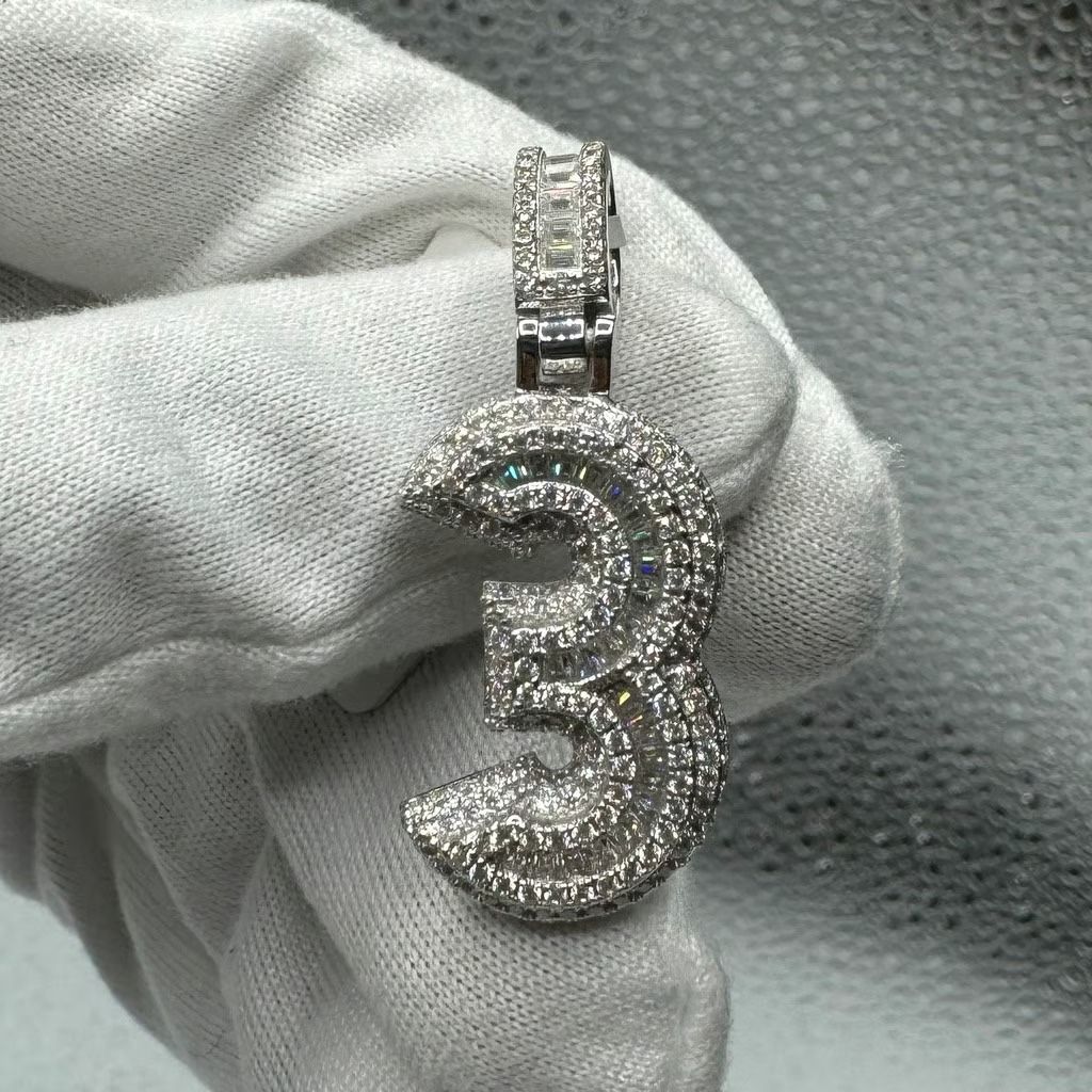 A Moissanite Number charm in Silver with moissanite of 2.35CTW