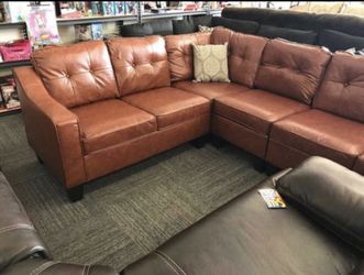 Light brown faux leather sectional