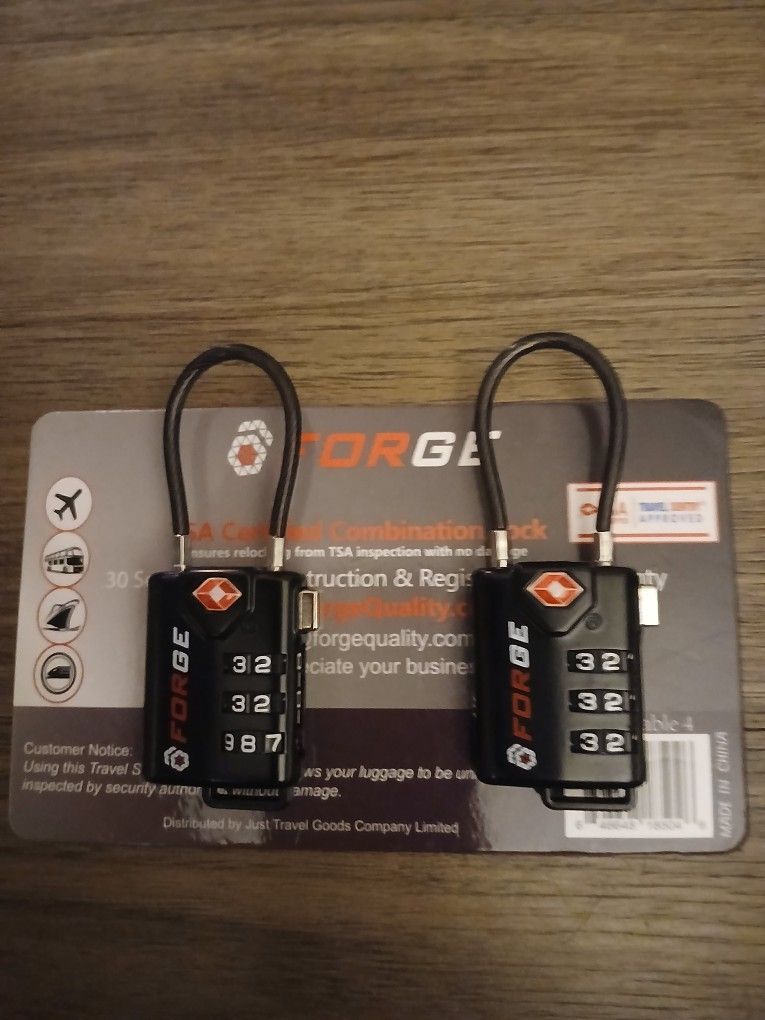 TWO LUGGAGE COMBINATION LOCKS FORGE