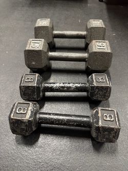 Pair of 15 and pair 8 lb dumbbells