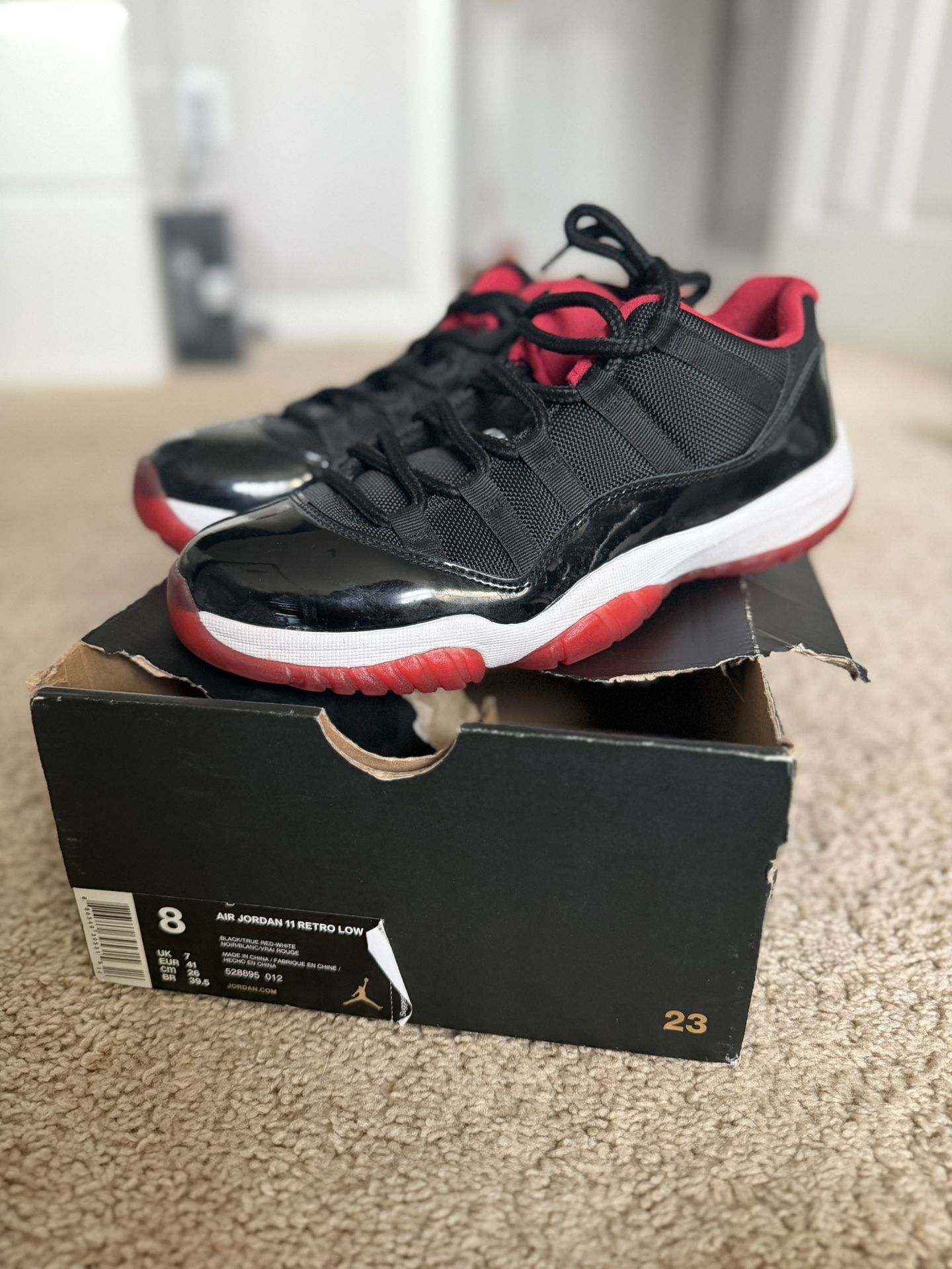 Jordan 11 Low Bred
