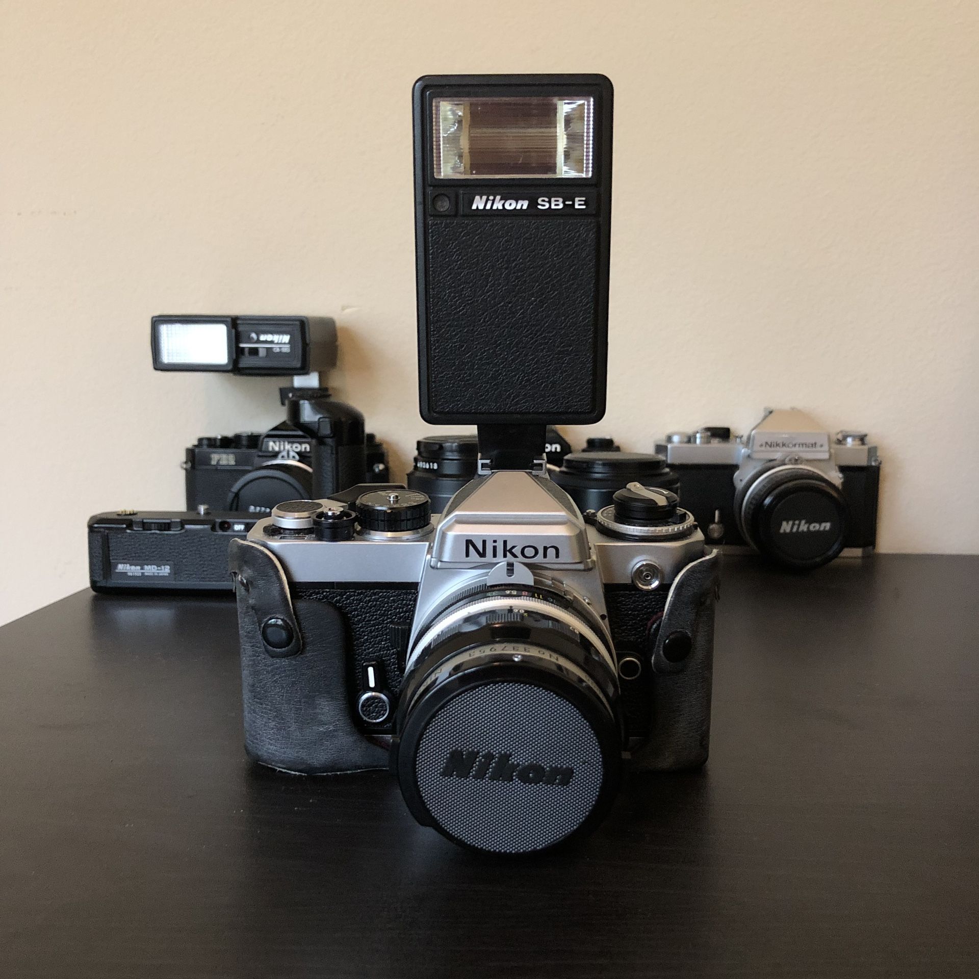 Nikon FE 35mm Film Camera SLR With Lens, Flash, and Case