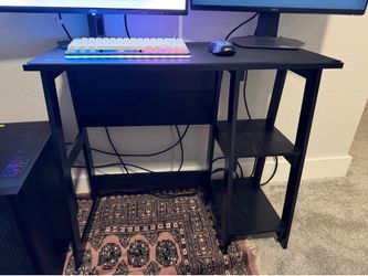 2 small desks and a chair