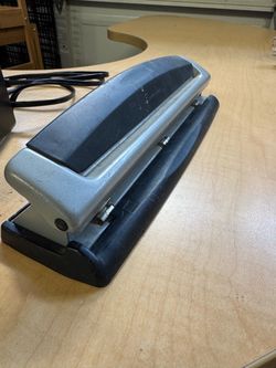 Pencil sharpener and 3-hole punch