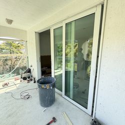 Impact triple sliding glass door