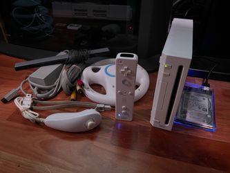 M0dded Nintendo Wii with lots of games READ DESCRIPTION