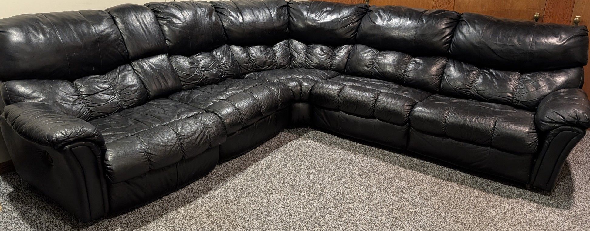 Large Real Leather Sectional With 2 Recliners And A Fold Out Sleeper