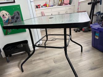 Outdoor glass patio table