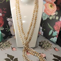 #2073, CHRYSANTHEMUM FOSSIL CORAL VINTAGE RARE NECKLACE 56"IN, GOLD PLATED SMALL BEADS.
