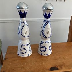 Empty tequila bottle with Bell