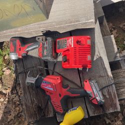 Milwaukee Saber Saw And Impact Drill 