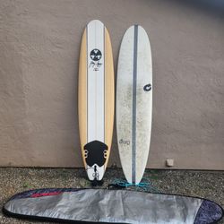 2 Surfboards, 1 Torq and 1 Gerry Lopez 