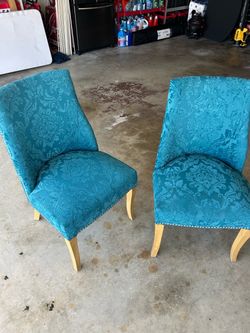 Tow teal chairs