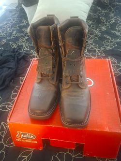 Steel toe boots...lace up brand new....