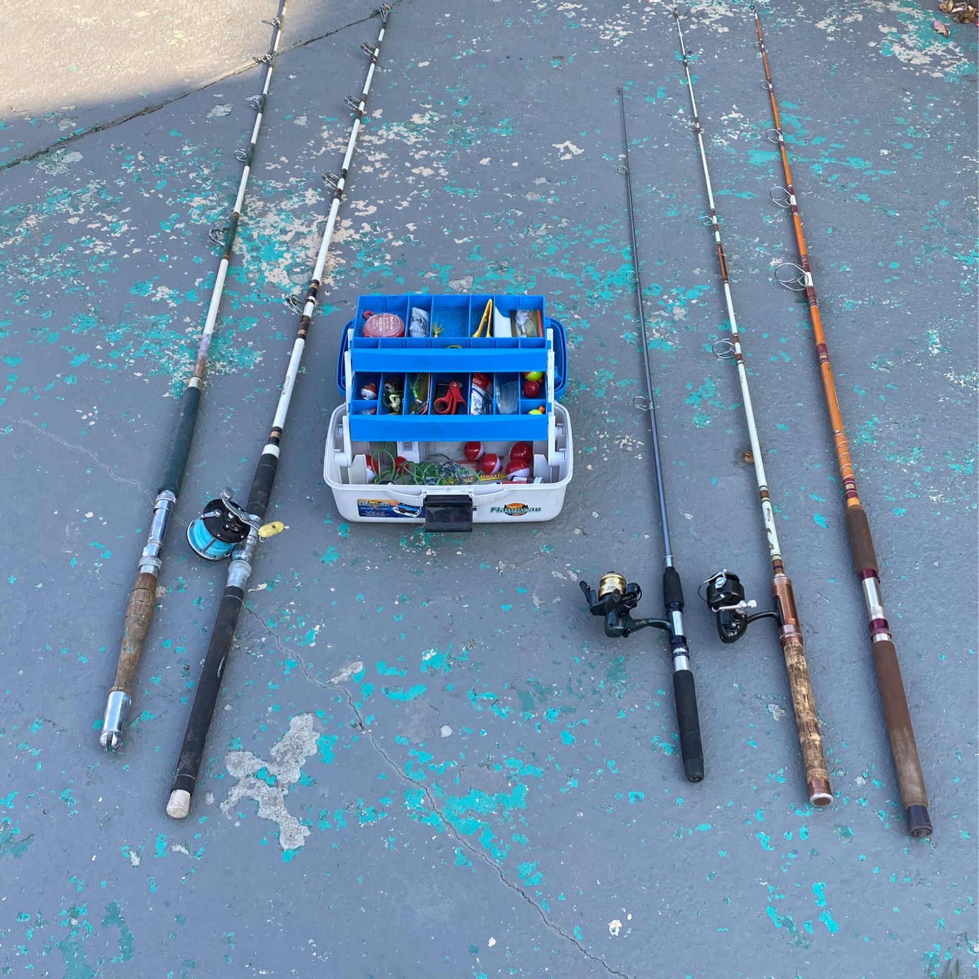 5 Vintage Fishing Rods And A Tackle Box 